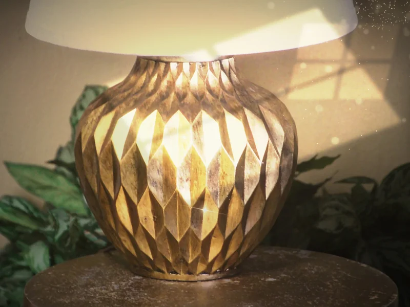 A faceted gold lamp glowing in afternoon sun