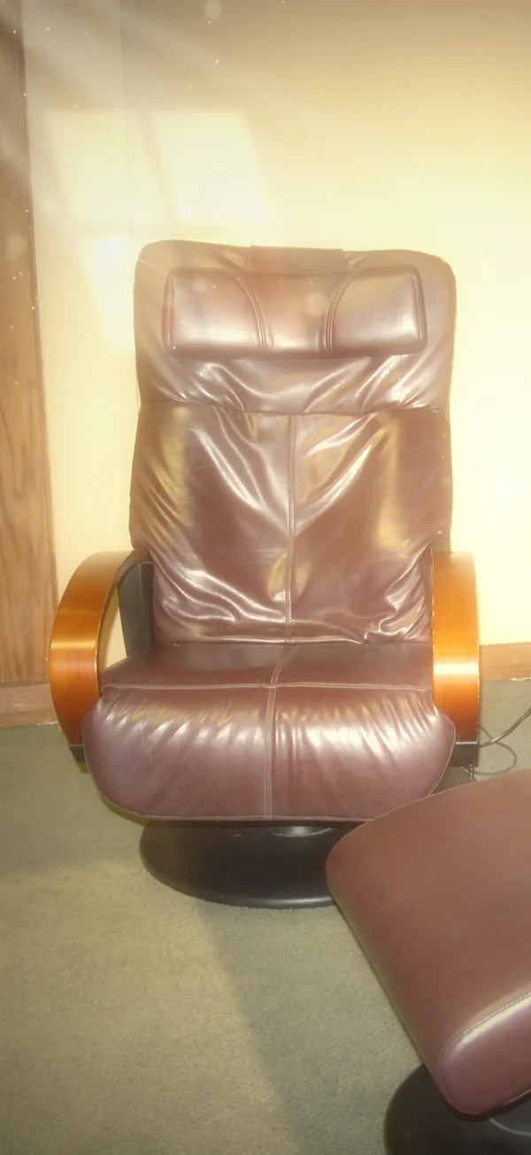 A leather massage recliner in warm afternoon light in the relaxation lounge